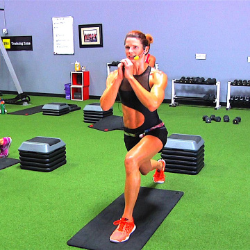 Instructor teaching an abs class