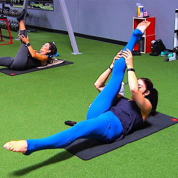 Instructor teaching a pilates class